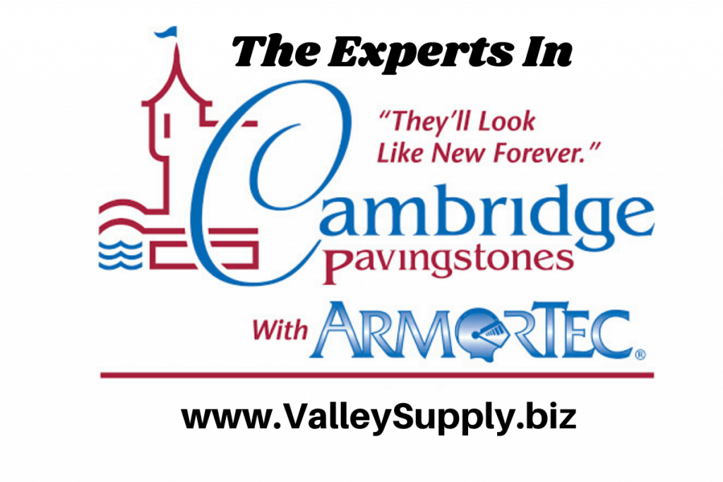 Logo for Cambridge Pavingstones, featuring a red and blue design with a castle and waves. The text reads, "The Experts In", "They'll Look Like New Forever", "Cambridge Pavingstones with ArmorTec". A web address, "www.ValleySupply.biz", is at the bottom. Ideal for Paving Stones in Queens County or Nassau County.